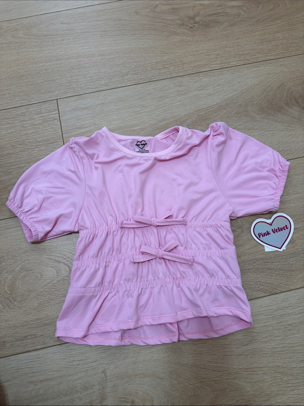 Velvet Pink Short-Sleeve Peplum Top with Bow Details